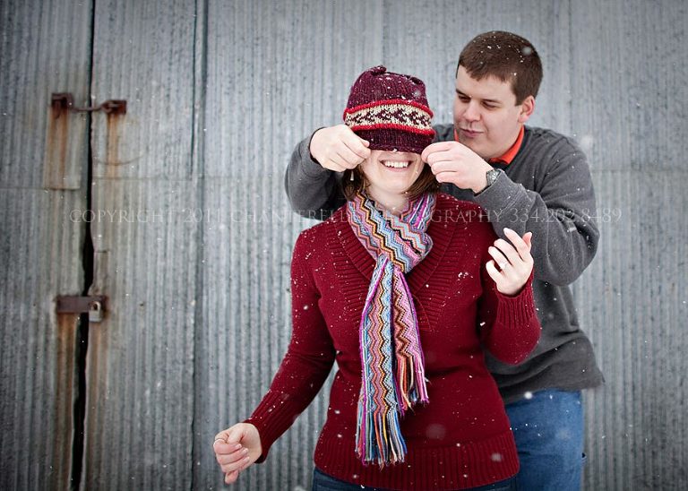 an engagement session in the snow in auburn alabama
