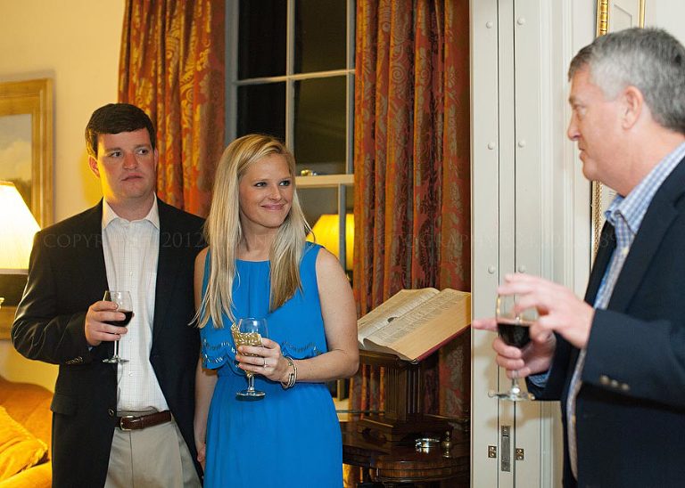 a toast at an engagement party before the couple's charleston destination wedding