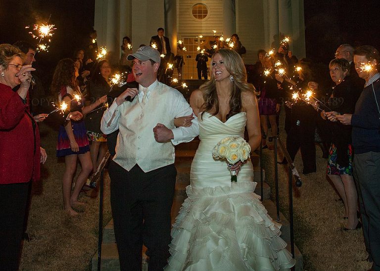 a sparkler exit to a new york city honeymoon after a wedding at the waters