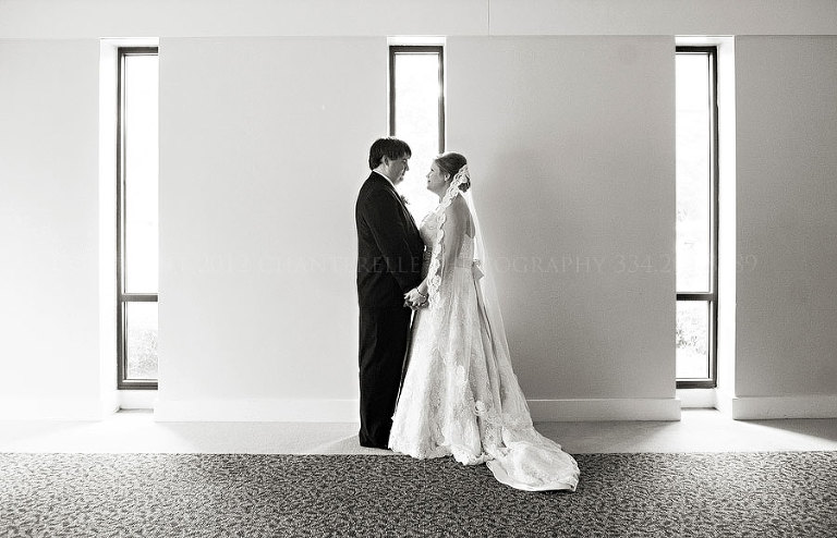 a bride and groom black and white at eastern hills baptist church in montgomery alabama
