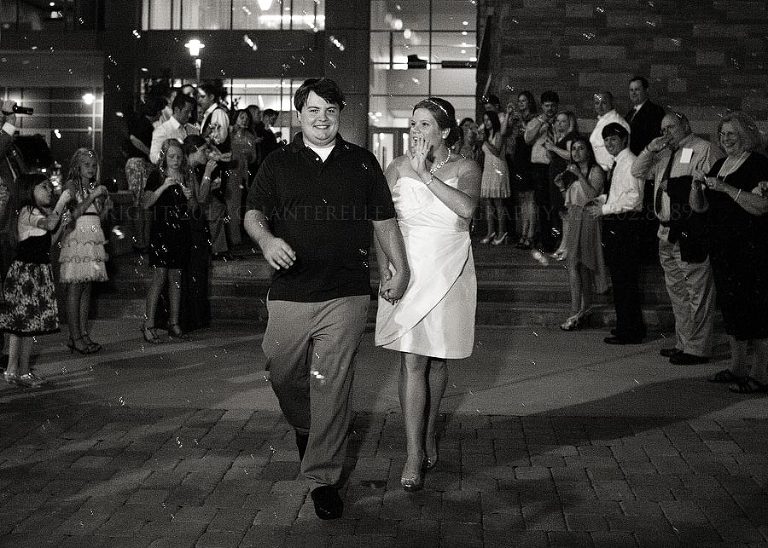 bride and groom bubble exit from a renaissance montgomery hotel wedding reception in alabama
