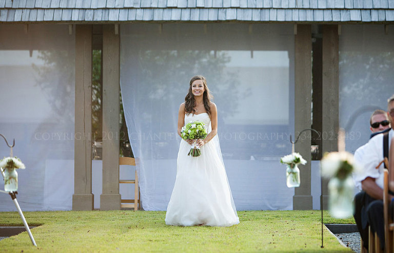 a bride walking down the aisle at a hampstead bocce pavillions wedding in montgomery