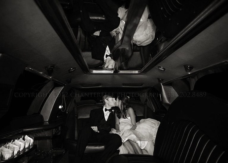bride and groom leave in a touch of class limo from their hampstead wedding