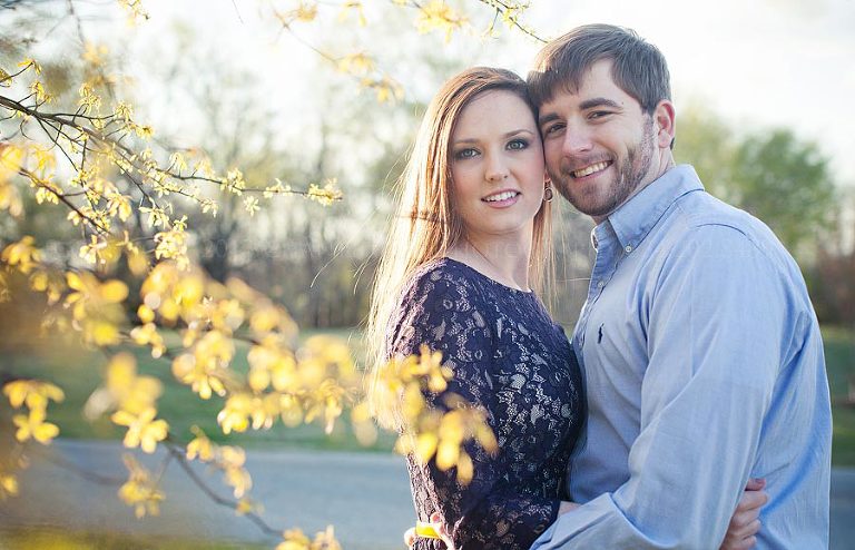 yellow flowers in a montgomery alabama engagement picture