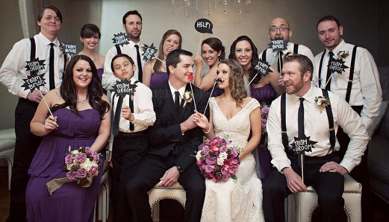 silly bridal party portrait at alley station in montgomery