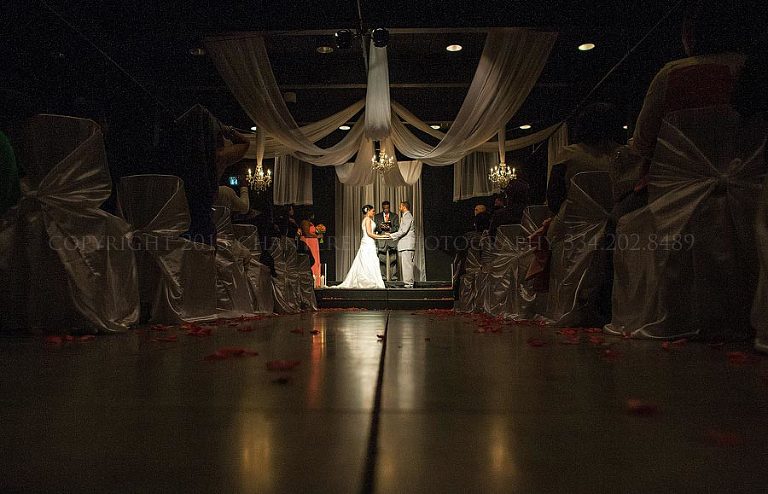 dramatic lighting and draping at a columbus convention center wedding