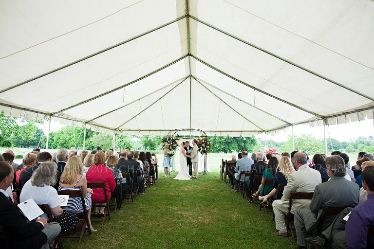 wedding under a tent at the oaks plantation in pike road alabama
