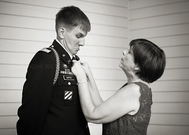 groom and his mother before his wedding at bragg mitchell mansion
