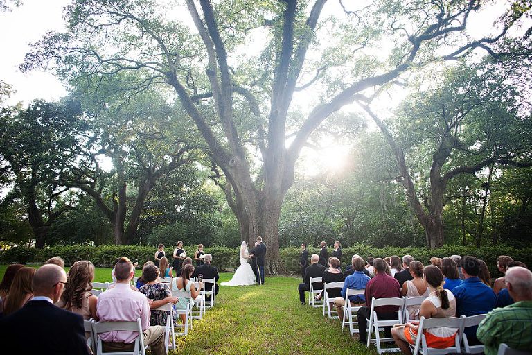 wedding under the oak trees at bragg mitchell mansion wedding
