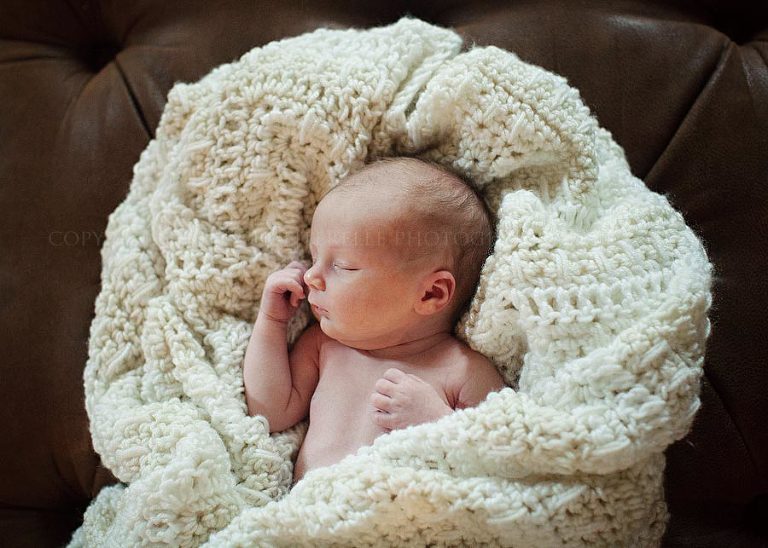 newborn baby in a blanket in alabama
