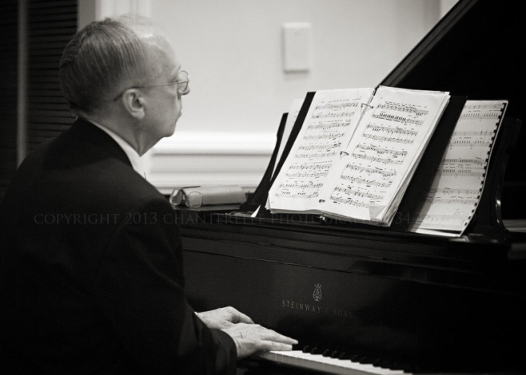 father of the bride playing piano at the first baptist church ceremony