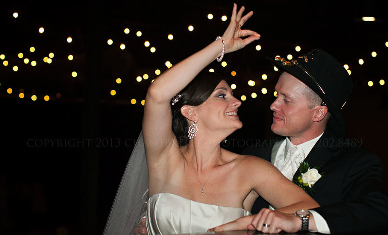 bride and groom at their event center downtown reception in opelika