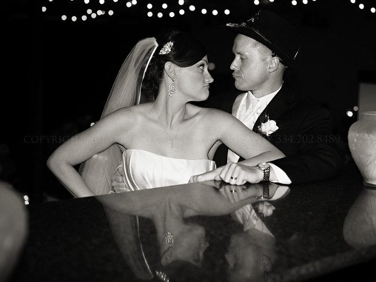 bride and groom silly reflection at their alabama reception