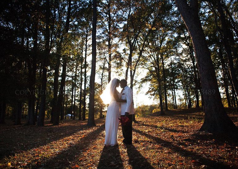 bride and groom in gold star park