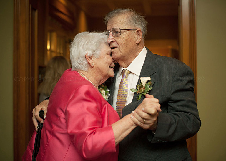 grooms parents dancing at auburn wedding reception