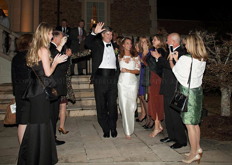 bride and groom making grand exit from fountainview mansion