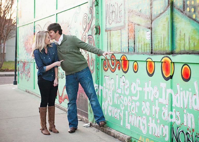 engagement session with graffiti in downtown mobile alabama