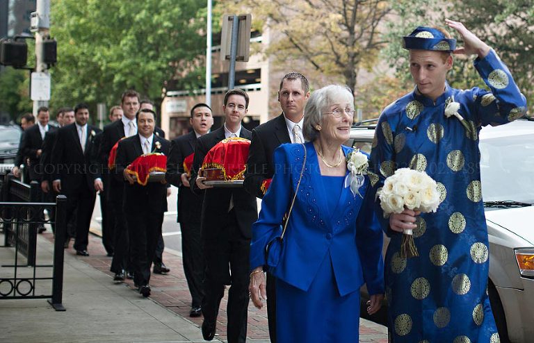 groom and groomsmen arriving for vietnamese tea ceremony