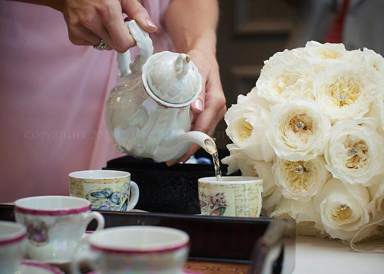 tea being poured for pre wedding ceremony