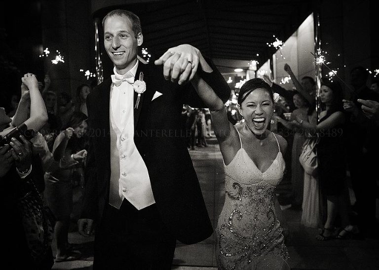 bride and groom leaving harbert center