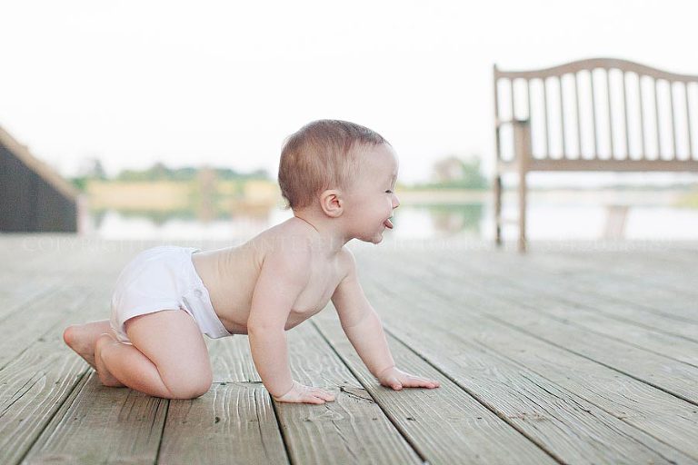 baby sticking his tongue out