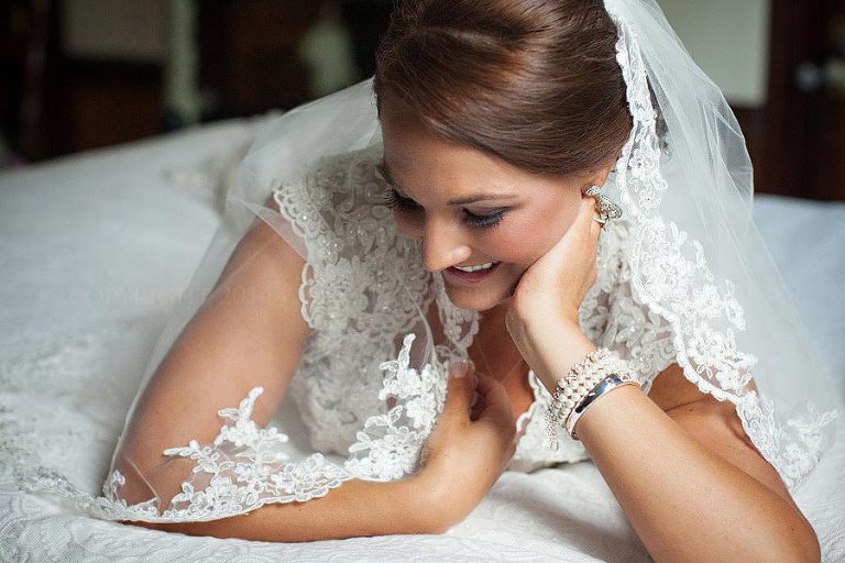 bride with lace veil at prattville wedding
