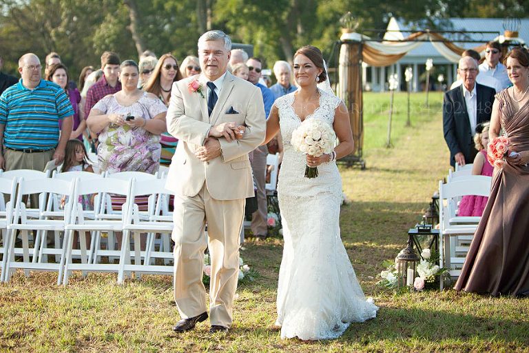 bride and her father walking down the aisle at prattville wedding