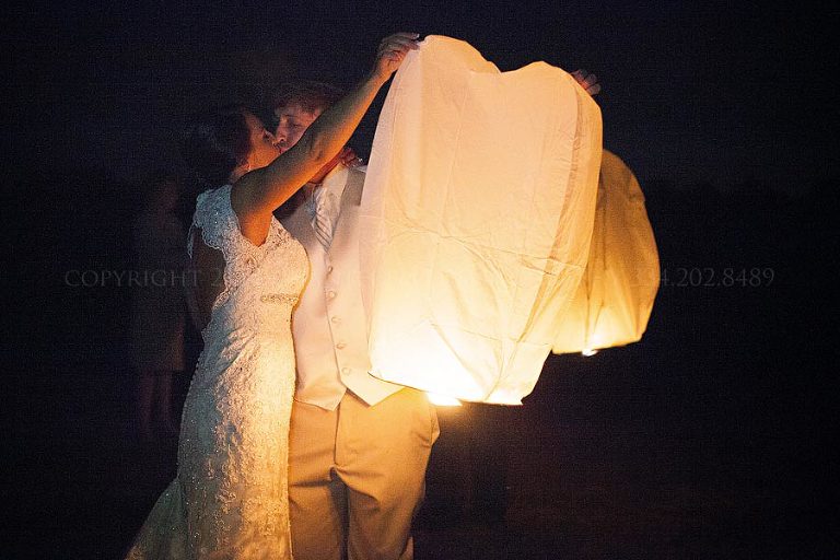 bride and groom releasing wish lantern