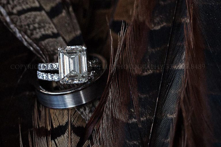 huge emerald cut engagement ring in pheasant feathers