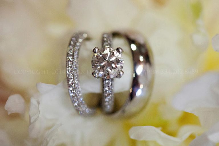 wedding rings in a peony
