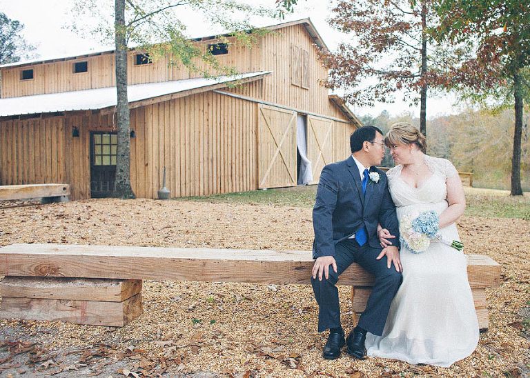 bride and groom at the barn at pisgah hill in grady