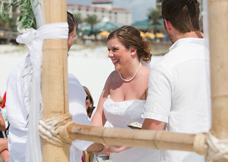 bride laughing during sandestin beach ceremony