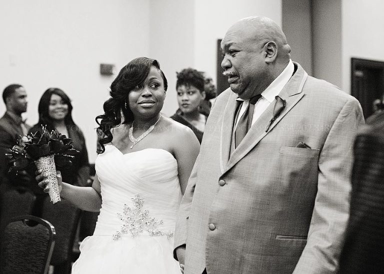 bride's dad crying as he walks her down the aisle
