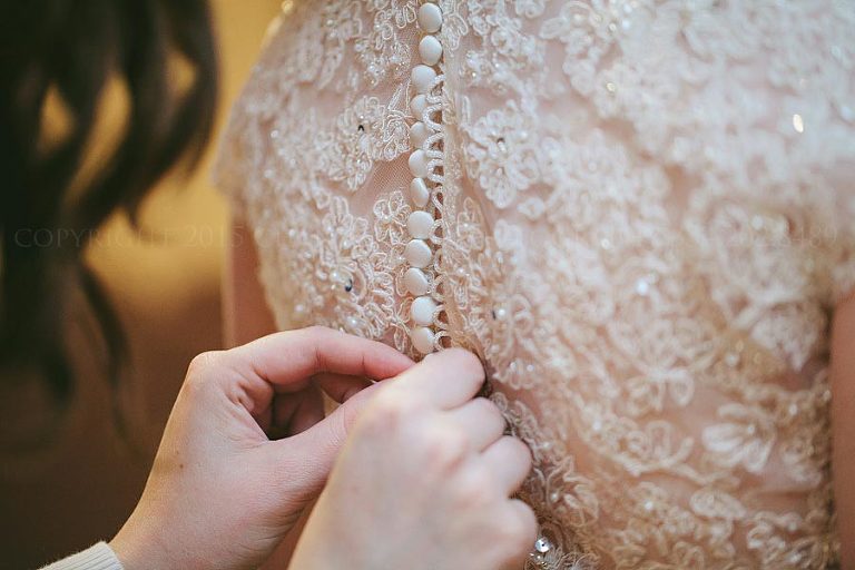 buttons on lace wedding gown