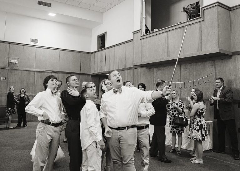 guests with selfie stick at wetumpka wedding