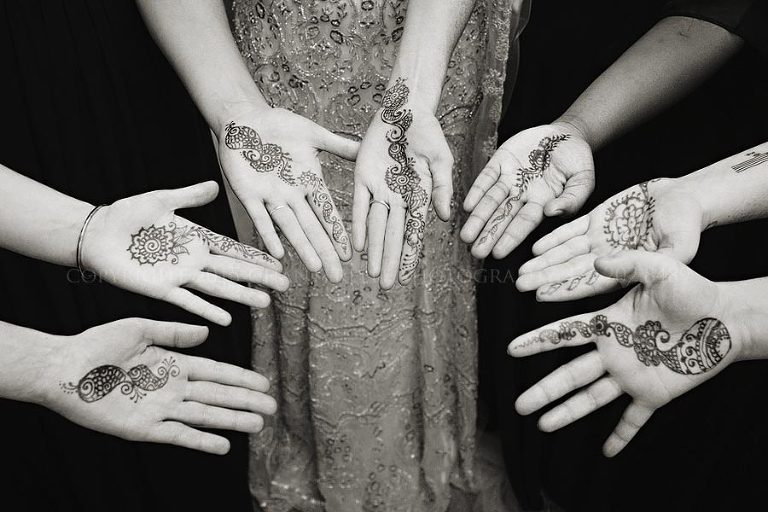 bridal party with henna tattoos on hands