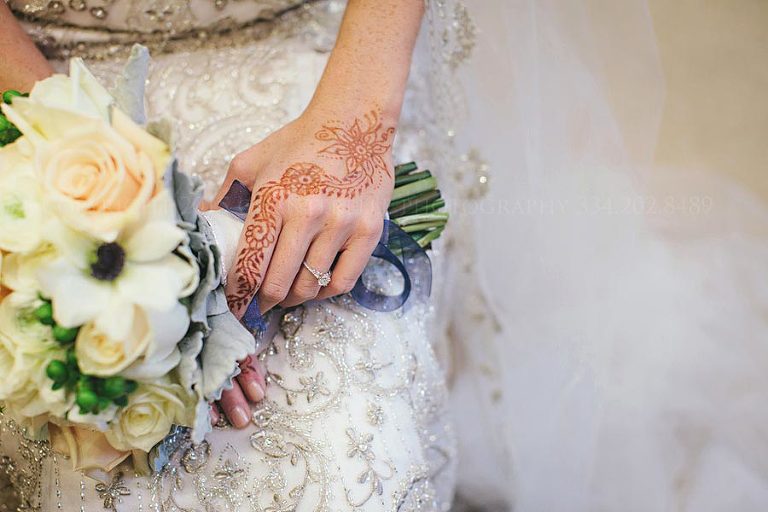 bride with henna on hands for wedding