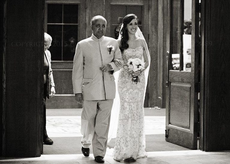 bride and father walking down the aisle at auburn wedding