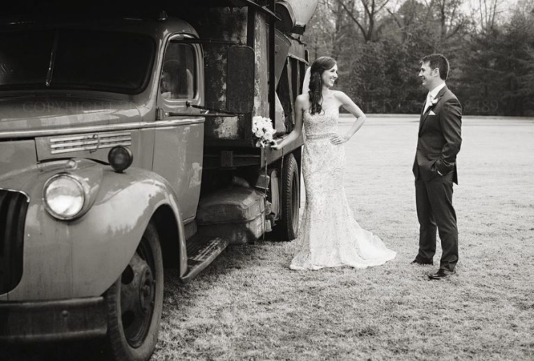 bride and groom with rustic truck in alabama