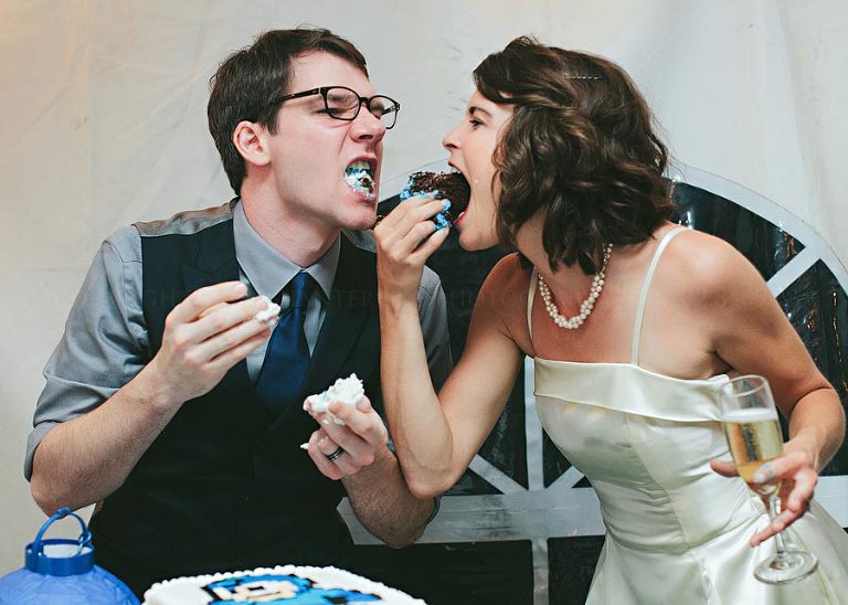 bride and groom eat cake at montgomery wedding