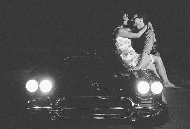 black and white film noir wedding portrait with old car