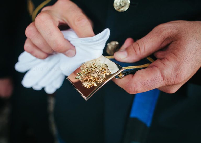 military groom shining belt buckle