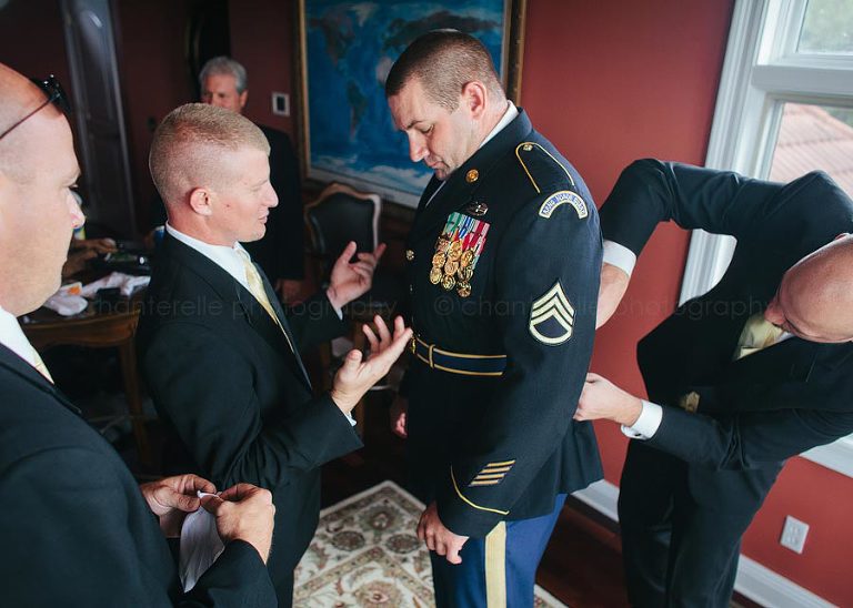 military groom getting ready for wedding