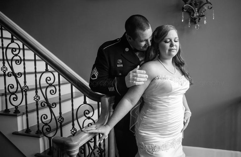 bride and groom black and white portrait in staircase