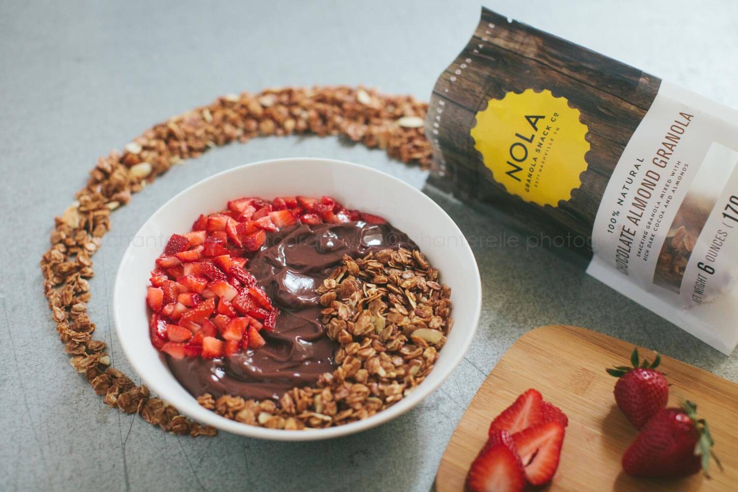 nola granola chocolate pudding bowl with strawberries