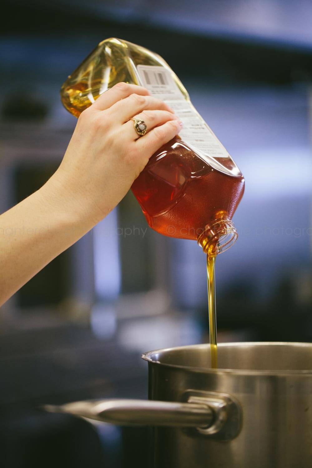 honey pouring into pot