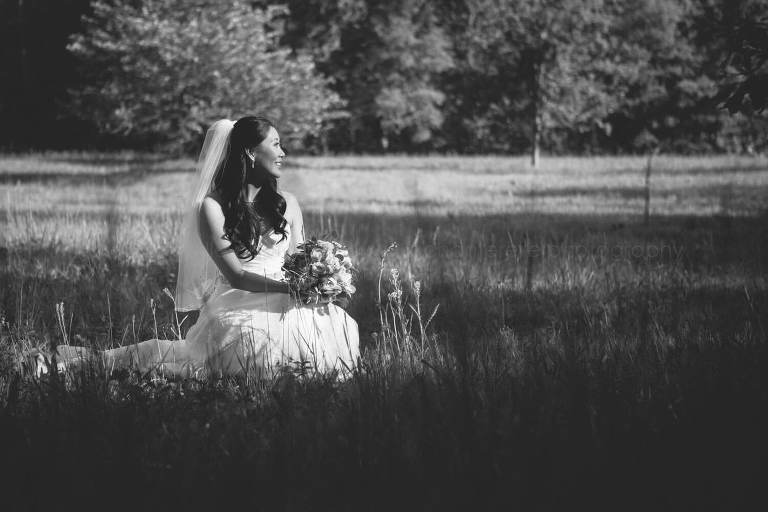 black and white bridal portrait in alabama field