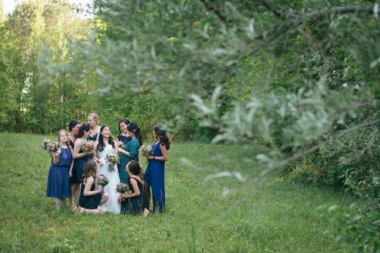 bride and bridesmaids in alabama field