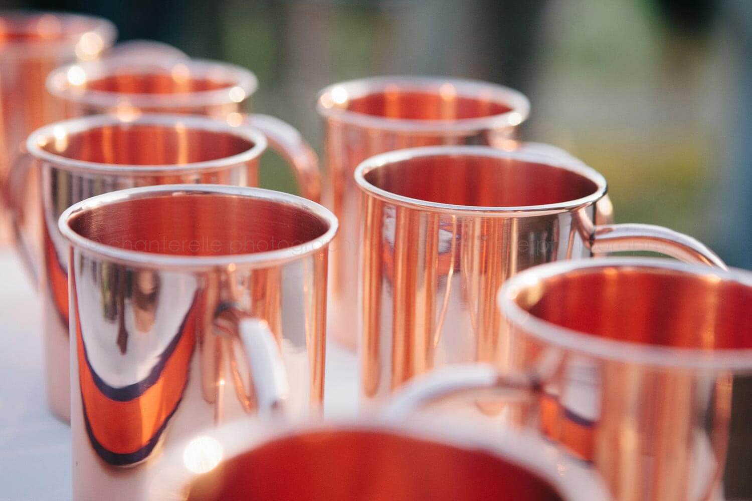 copper moscow mule mugs at alabama wedding reception