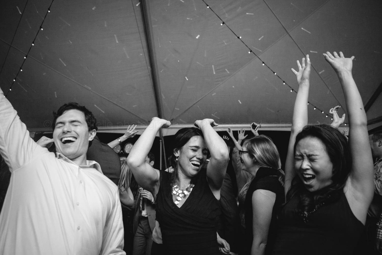 guests partying and dancing at auburn area farm wedding